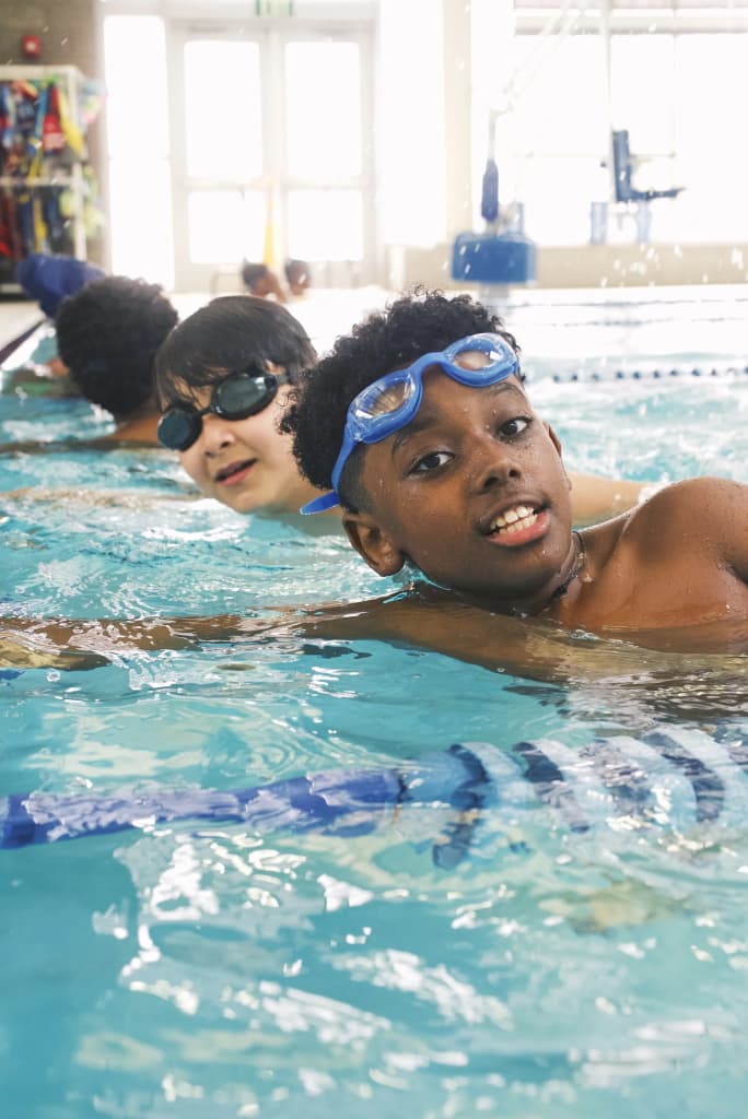 Kids smiling during a Tankproof swim lesson